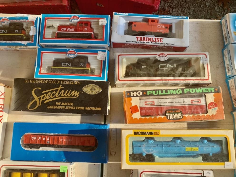 CN and CP Cabooses. Engine, Forest Products box car, oil tanker.