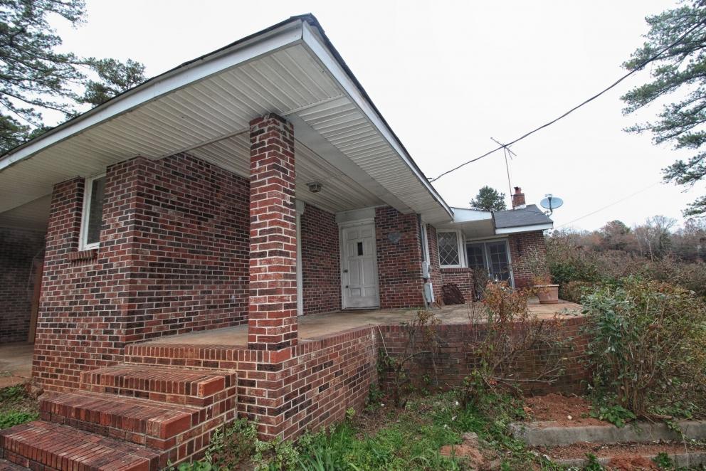 Brick home and six acres of property in Anderson, South Carolina. This property will be offered